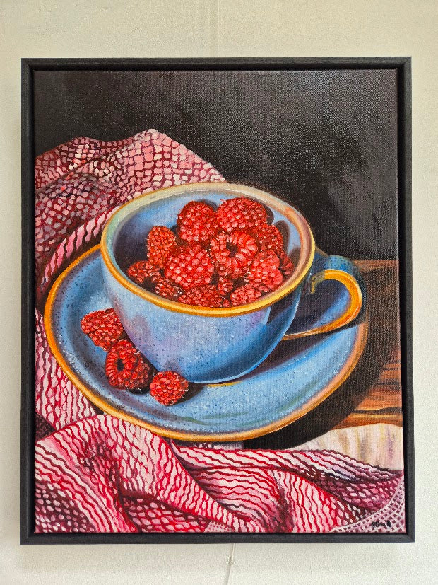 Original oil painting of a blue cup filled with raspberries on a red lace cloth