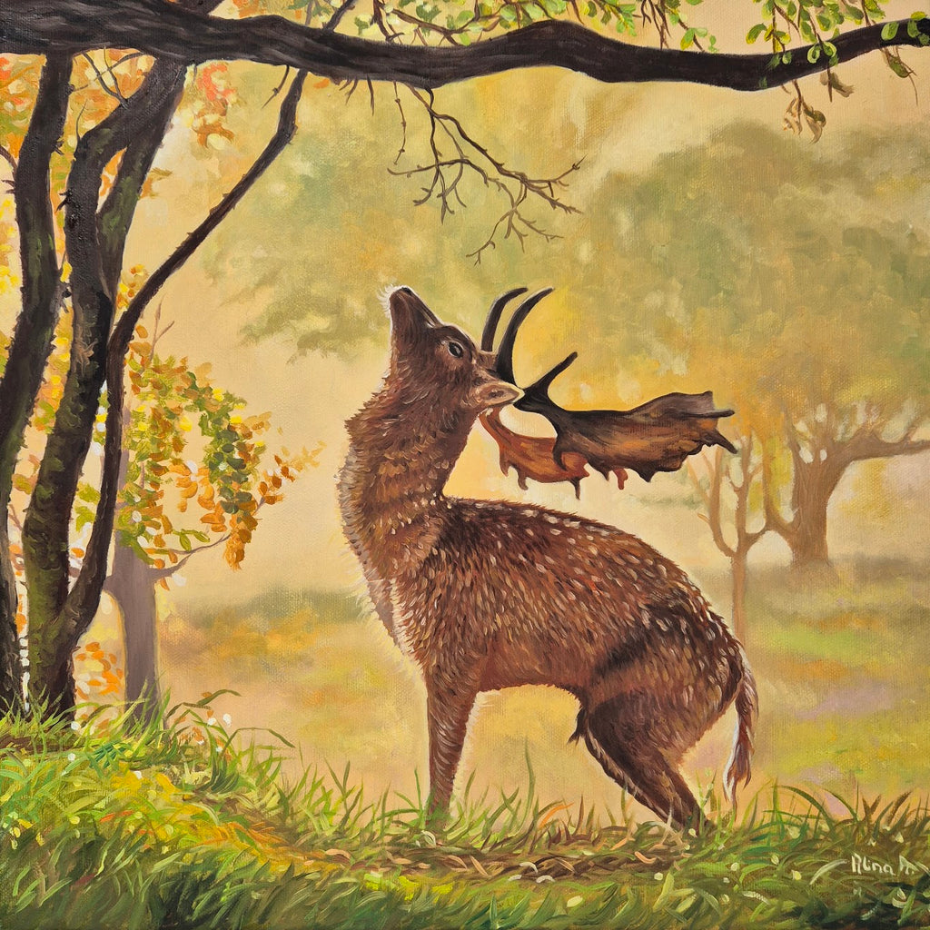 Original oil painting of a deer stretching to reach tree branches in golden woodland light